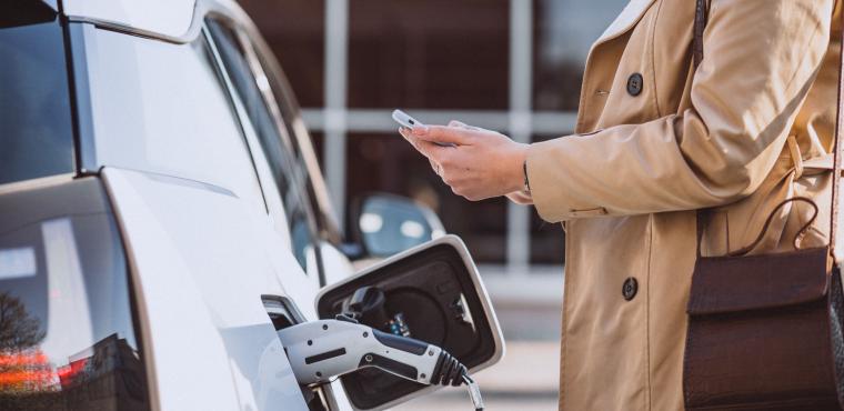woman-charging-electro-car-electric-gas-station.jpg